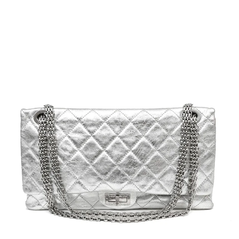 Chanel bags for the minimalist fashionChanel Metallic Silver Maxi Classic Reissue 2.55