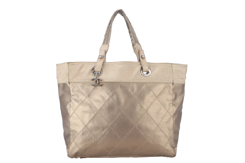 Chanel bags with exclusive seasonal designs and materialsCHANEL PARIS BIARRITZ TOTE BAG (1139xxxx) LARGE GOLD CALFSKIN SILVER HARDWARE NO DUST COVER