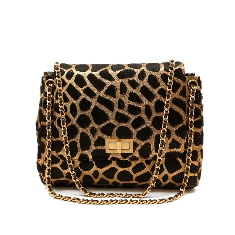 Chanel bags available at online luxury retaileChanel Black and Gold Giraffe Pattern Limited Edition